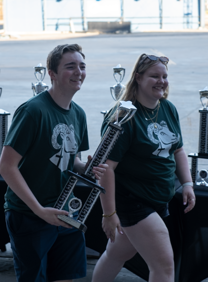 5.10.25 (From L to R) Seniors Luke Auer and Madi Gibson receiving Billings Central’s band’s first place trophy for Class A. 